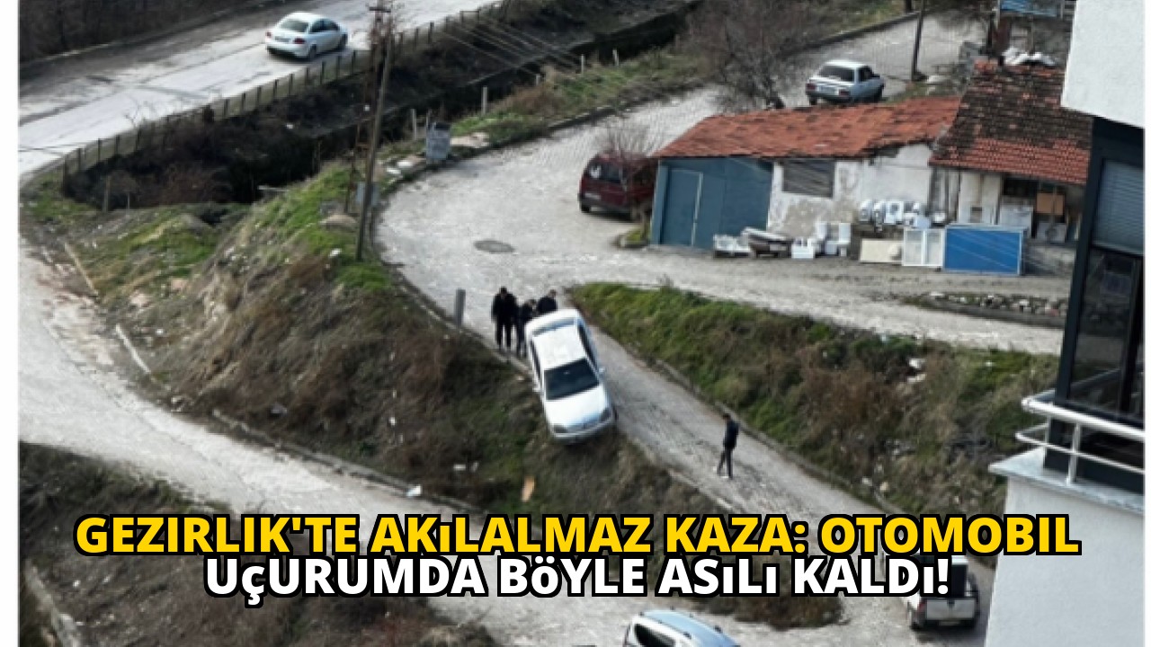 Gezirlik'te akılalmaz kaza: Otomobil uçurumda böyle asılı kaldı!